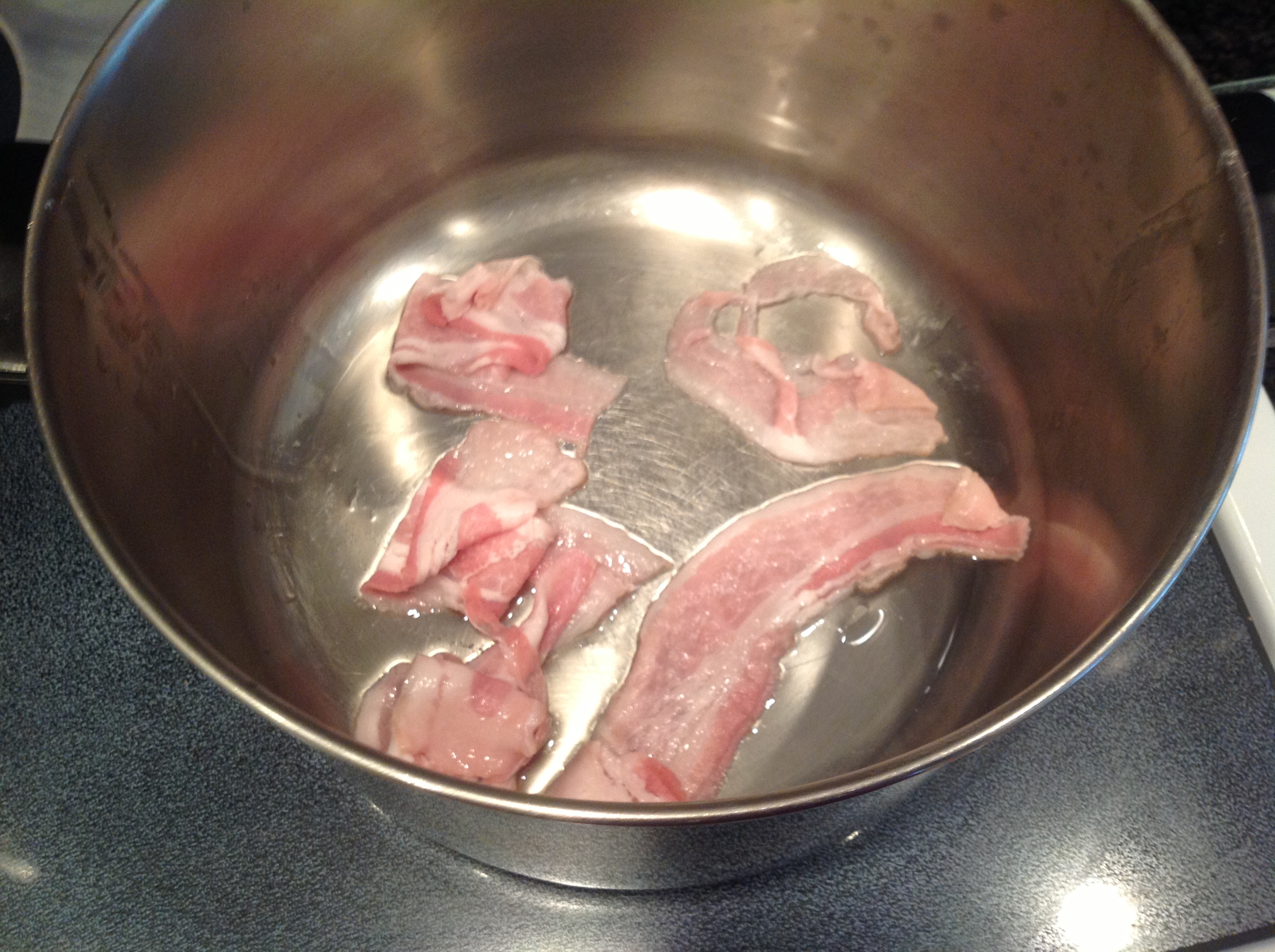Fying bacon up in a pan